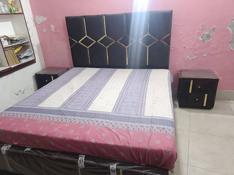 king size bed with side table 0