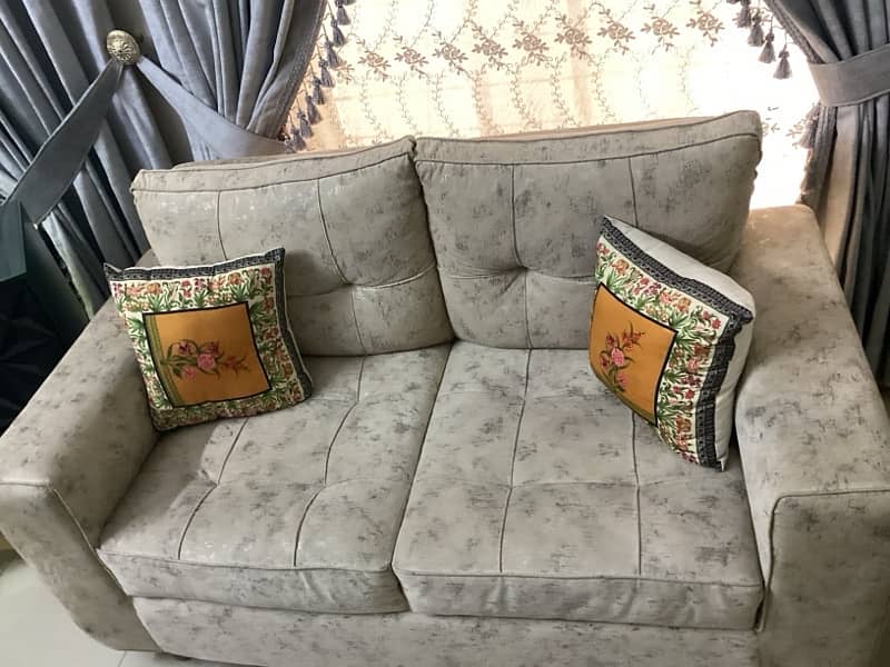 sofa  seater beige colored  fabric 2