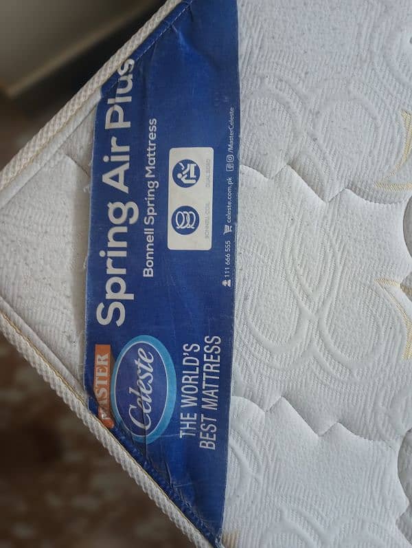 Bed with spring mattress for sale 1