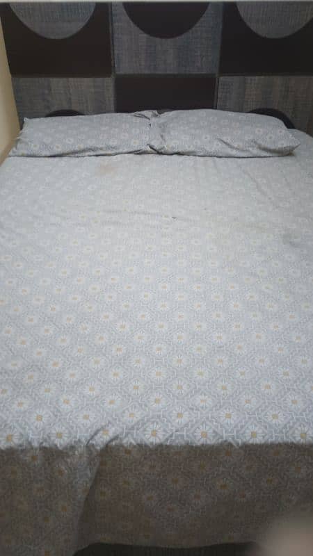 Bed with spring mattress for sale 4