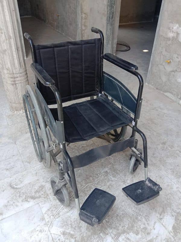 wheel chair in excellent condition 0