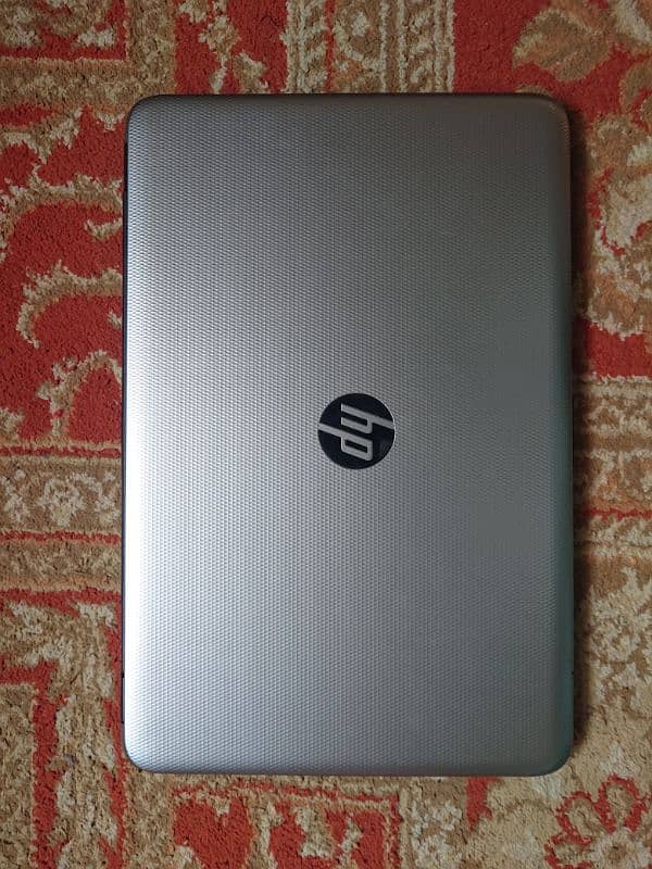 Hp Notebook Core I3 5th in A+ Condition with it's Original Charger 1