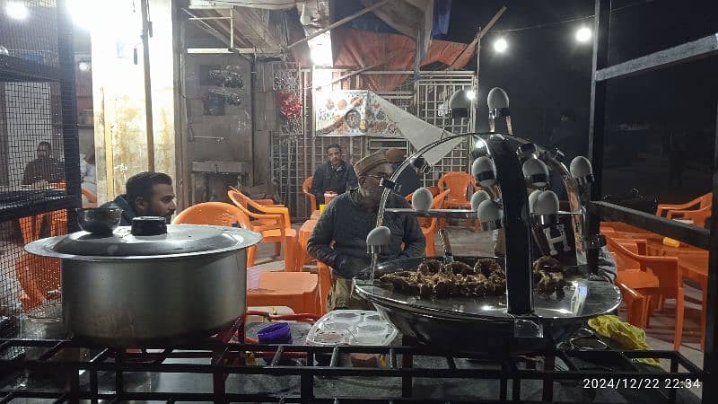 food stall, counter for chips, limca soup, french fries. 10