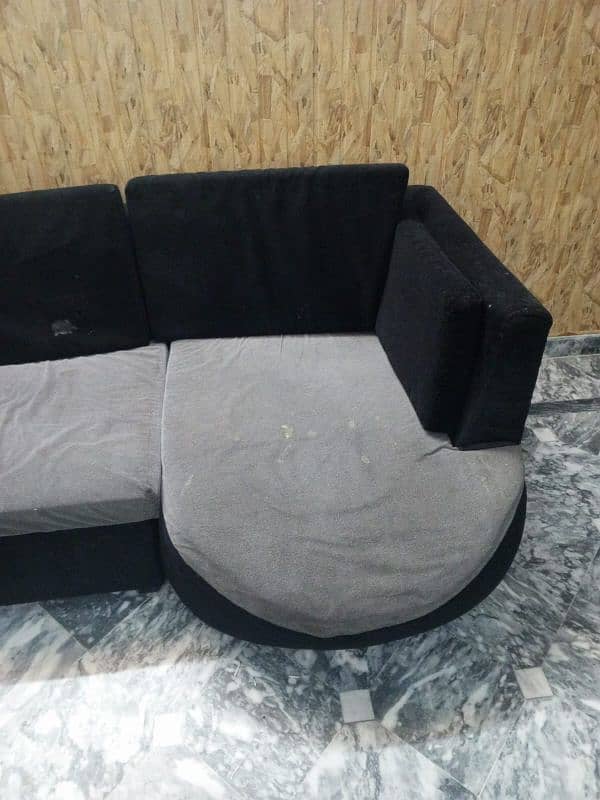 l shape sofa in black colour 1