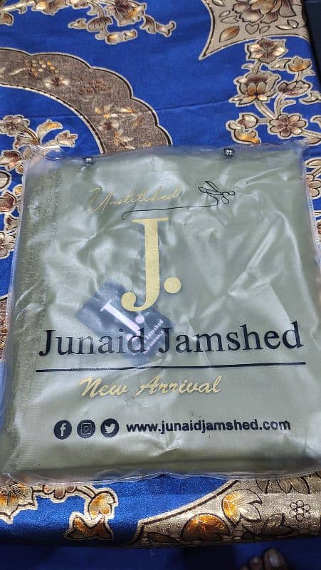 Junaid Jamsheed, J brand branded suit available Unstich. 1