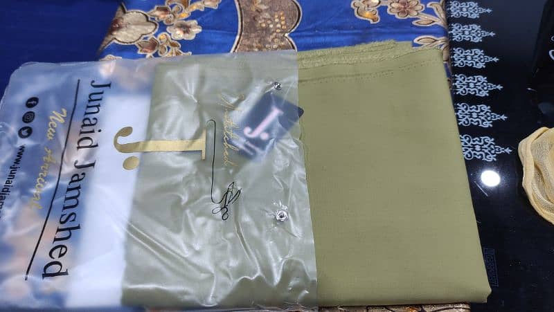 Junaid Jamsheed, J brand branded suit available Unstich. 3