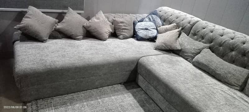 L shaped  grey color sofa 3