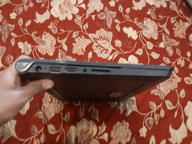 black laptop with charger used good culality dell company 2gb ram 2