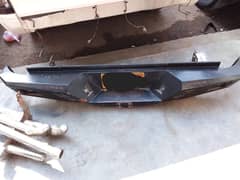 hammer back front bumper with side skirts and roll bar original