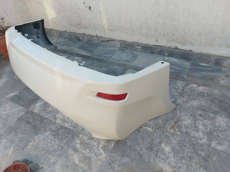 Toyota Gli white 2018 original Bumpars and mud flaps 0