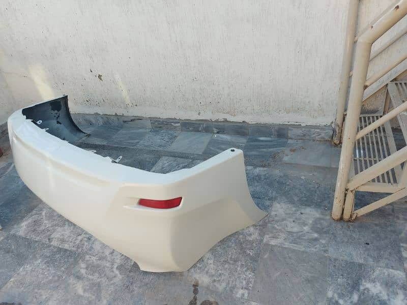 Toyota Gli white 2018 original Bumpars and mud flaps 2