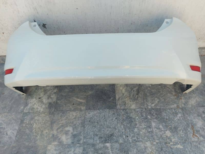 Toyota Gli white 2018 original Bumpars and mud flaps 6