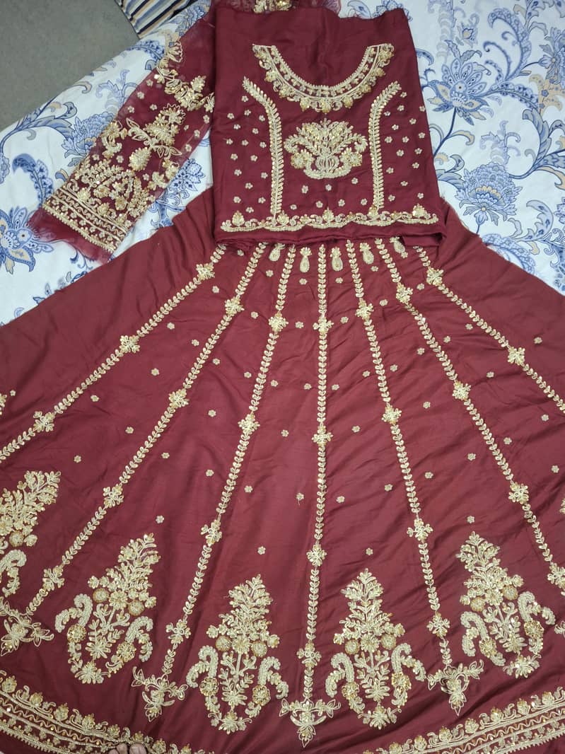 Unstitched hand embelished bridal lehnga 0