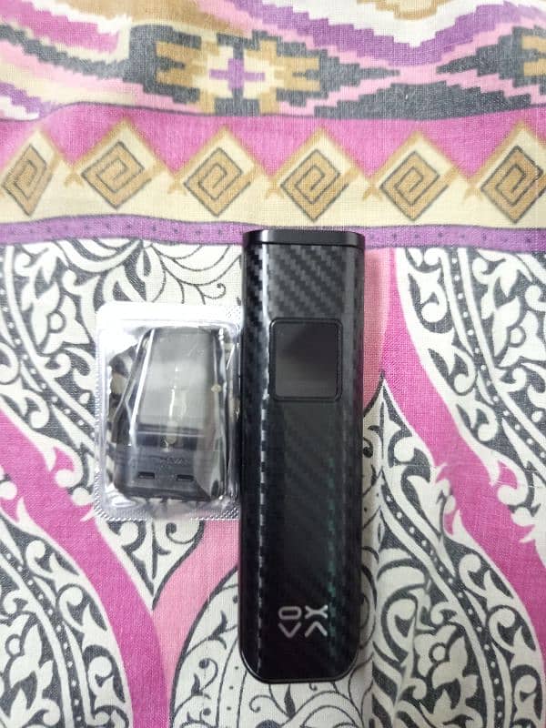 Oxva Xlim pro carbon fibre with 0.8 packed coil pod/vapes 1