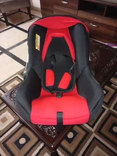 Baby Carrying Cot and bouncer for sale