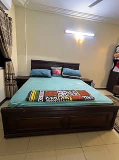 king size wooden bed with side drawers