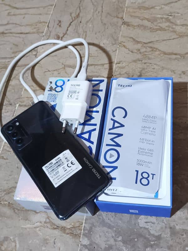 tecno camon 18t. . . 4/128 with complete box charger 0