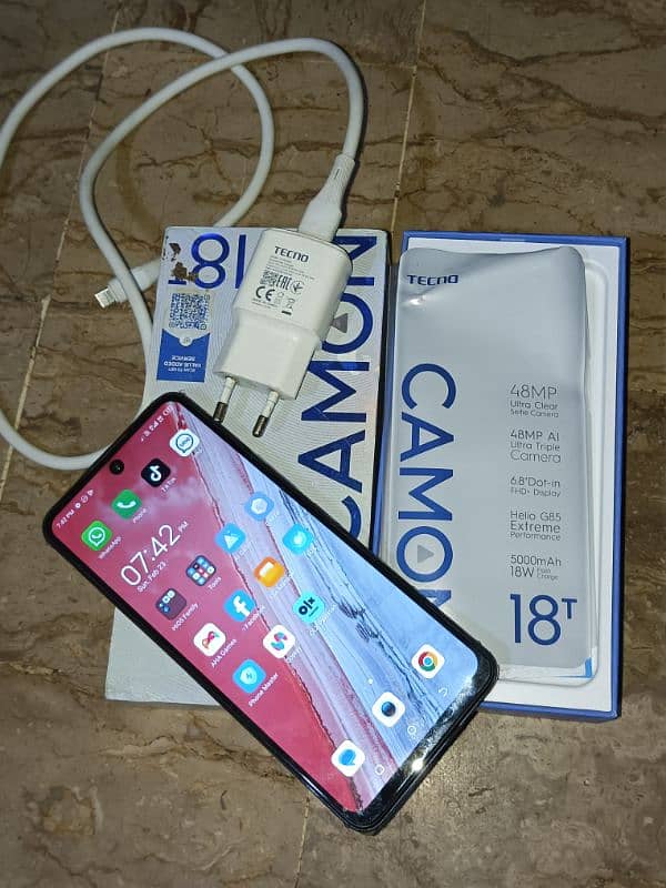 tecno camon 18t. . . 4/128 with complete box charger 1