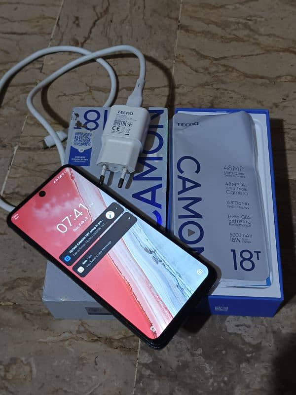 tecno camon 18t. . . 4/128 with complete box charger 7