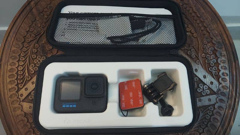 Go Pro Hero 12 with accessories and SD card 1