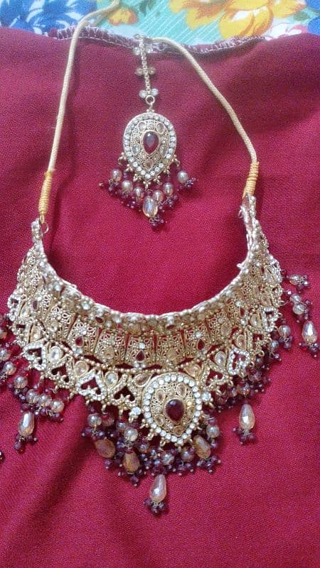 jewelry set golden color mehroon perls 1 time used 1