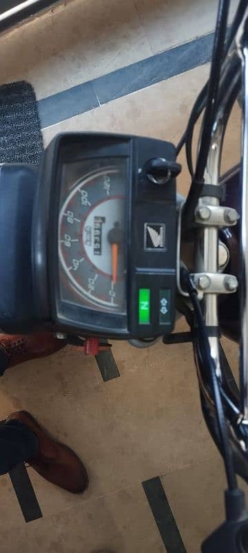 Assalam o alaikum I am selling honda cd  70  2022 model total genuine 4