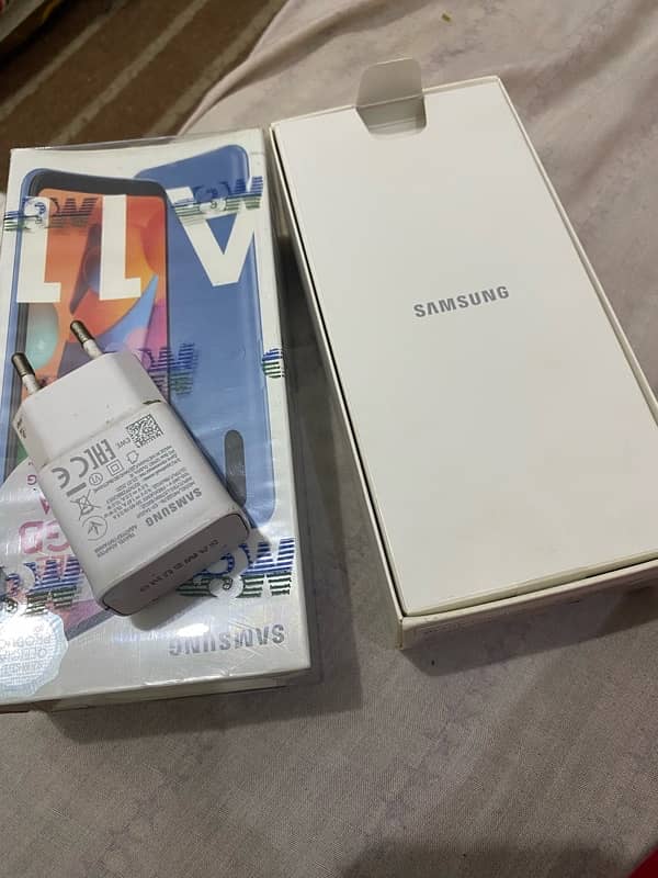 Samsung A11 with box and charger 1