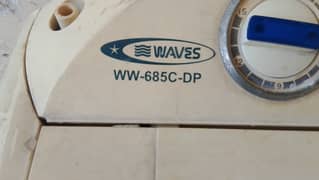 Used , waves washing machine and dryer