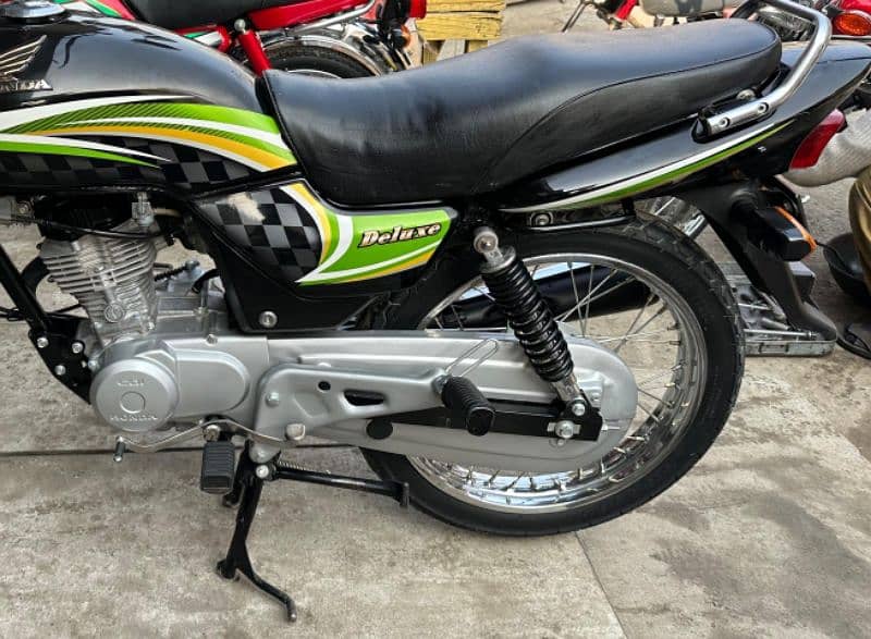 Honda deluxe. mobile number 0340 5443364. 1