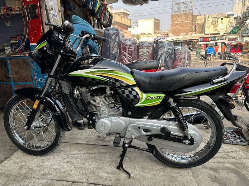 Honda deluxe. mobile number 0340 5443364. 7