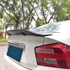 Universal duck tail spoiler