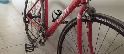 Bicycle-Brand giant- color Racing red- size medium- frame aluminium-