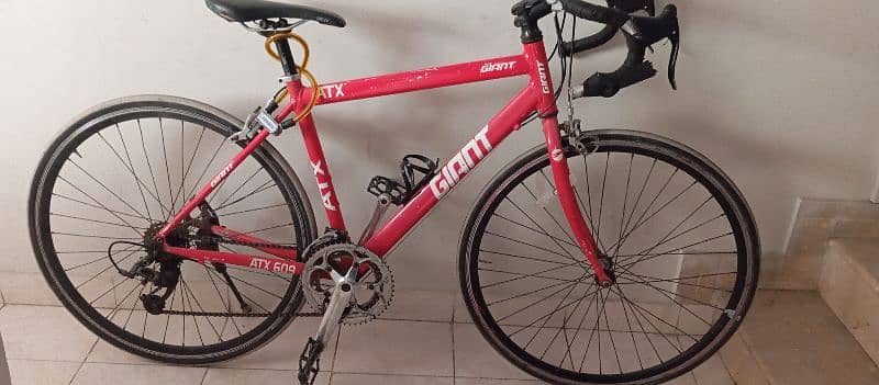 Bicycle-Brand giant- color Racing red- size medium- frame aluminium- 1