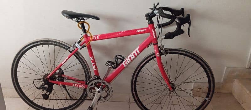 Bicycle-Brand giant- color Racing red- size medium- frame aluminium- 2