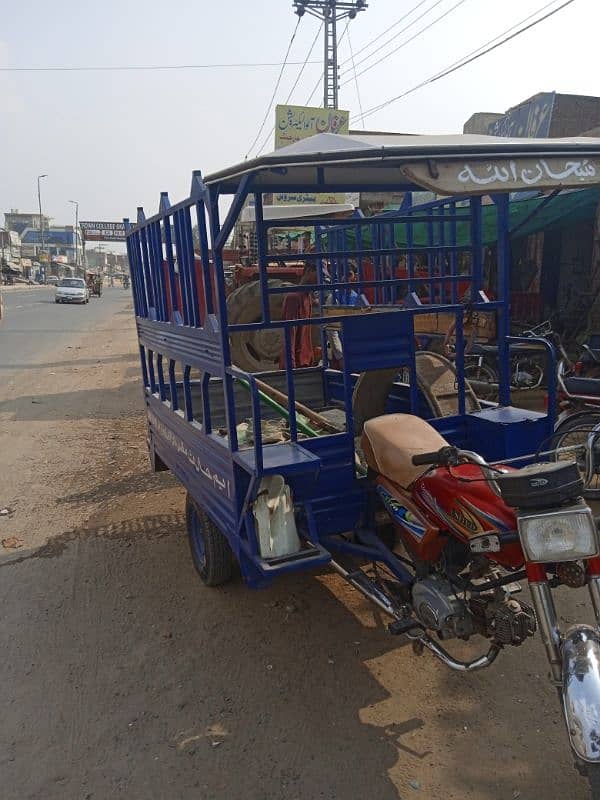 united 100cc auto riksha . 1