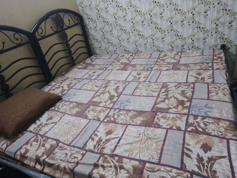 2 single iron beds with mattresses for sale in Karachi 0