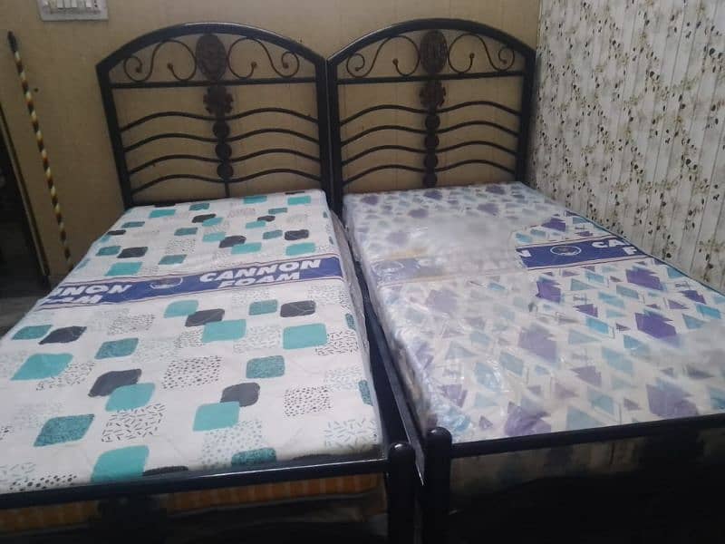 2 single iron beds with mattresses for sale in Karachi 2