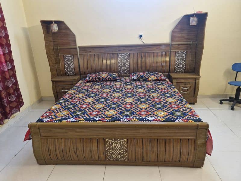 2 wooden beds with new mattress for sale. 0