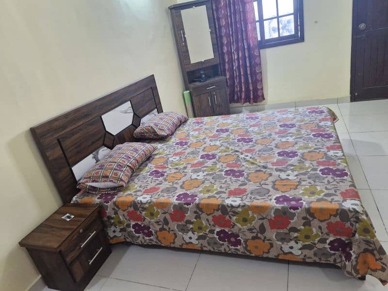 2 wooden beds with new mattress for sale. 4