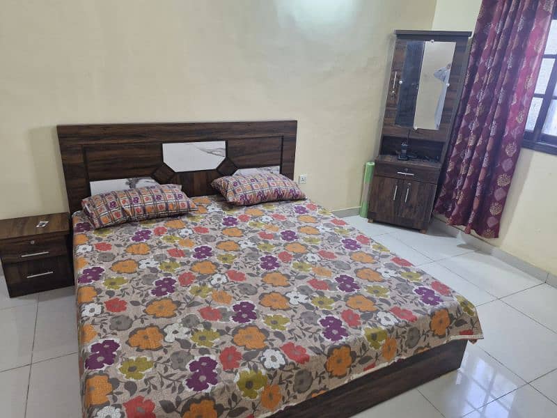 2 wooden beds with new mattress for sale. 5