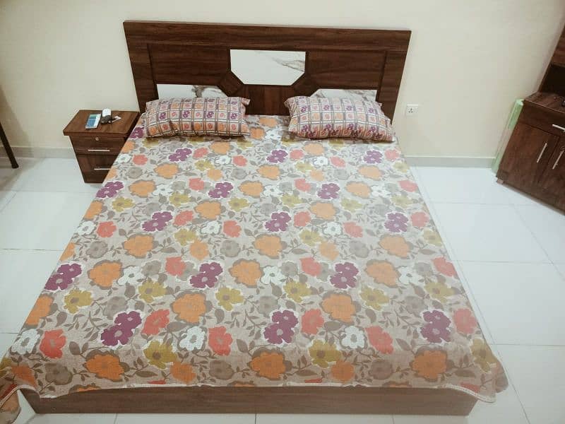 2 wooden beds with new mattress for sale. 7