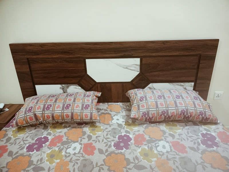 2 wooden beds with new mattress for sale. 9