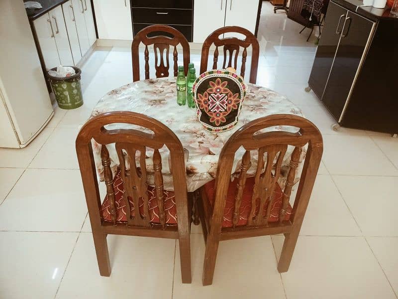 Dining table with 4 wooden chairs for sale. 1