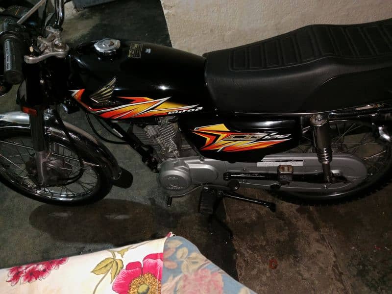 20 ke 12 month ka bike ha 21  model ha number 23 Mai Laga ha 4