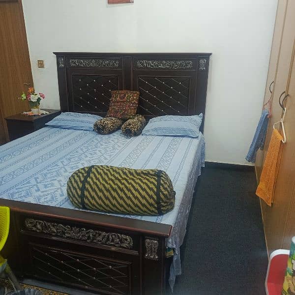 used double bed with side table 1