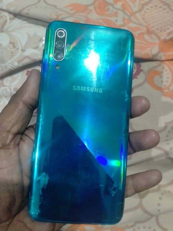 Samsung a30s 4/64pta aproved 6