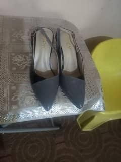 one pair grey nd black in new condition shoes no 37