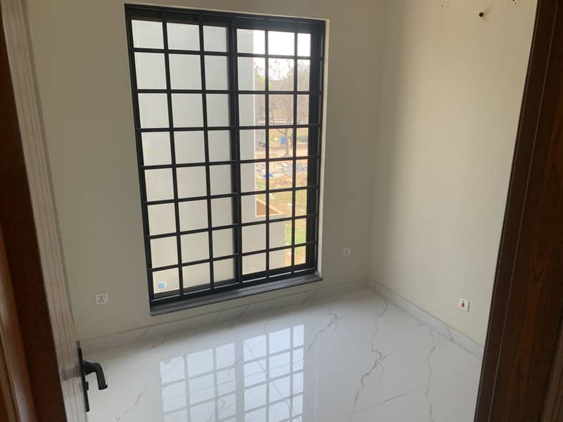 5 MARLA 4 BEDROOM BRAND NEW HOUSE ON GOOD LOCATION OF DHA PHASE 11 RAHBAR IS AVAILABLE FOR SALE 25