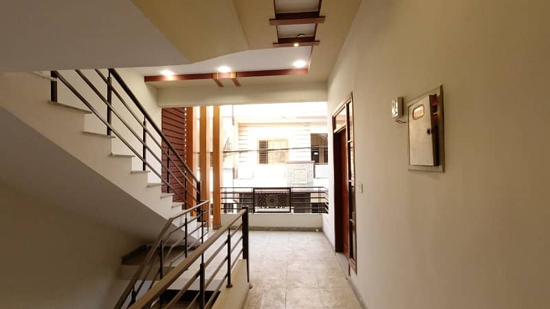 Independent Double Storey Brand new 120 yds stunning bungalow available for rent. Ground floor: 2 bedrooms, drawing room, lounge, American kitchen, tiled flooring. 2