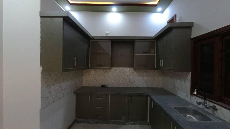 Independent Double Storey Brand new 120 yds stunning bungalow available for rent. Ground floor: 2 bedrooms, drawing room, lounge, American kitchen, tiled flooring. 13